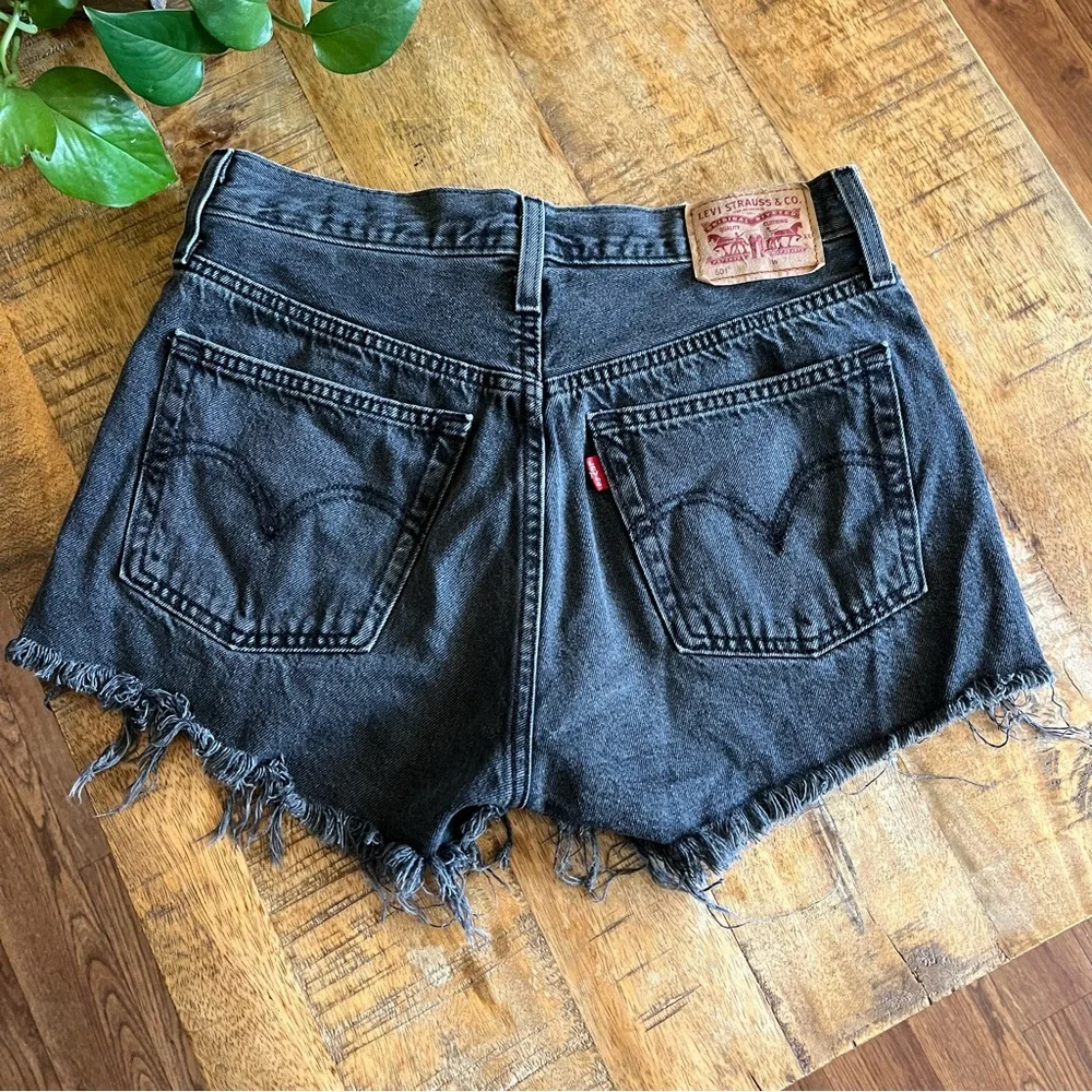 Levi's 501 Original Cutoff Denim Shorts in a faded black wash, high-rise waist